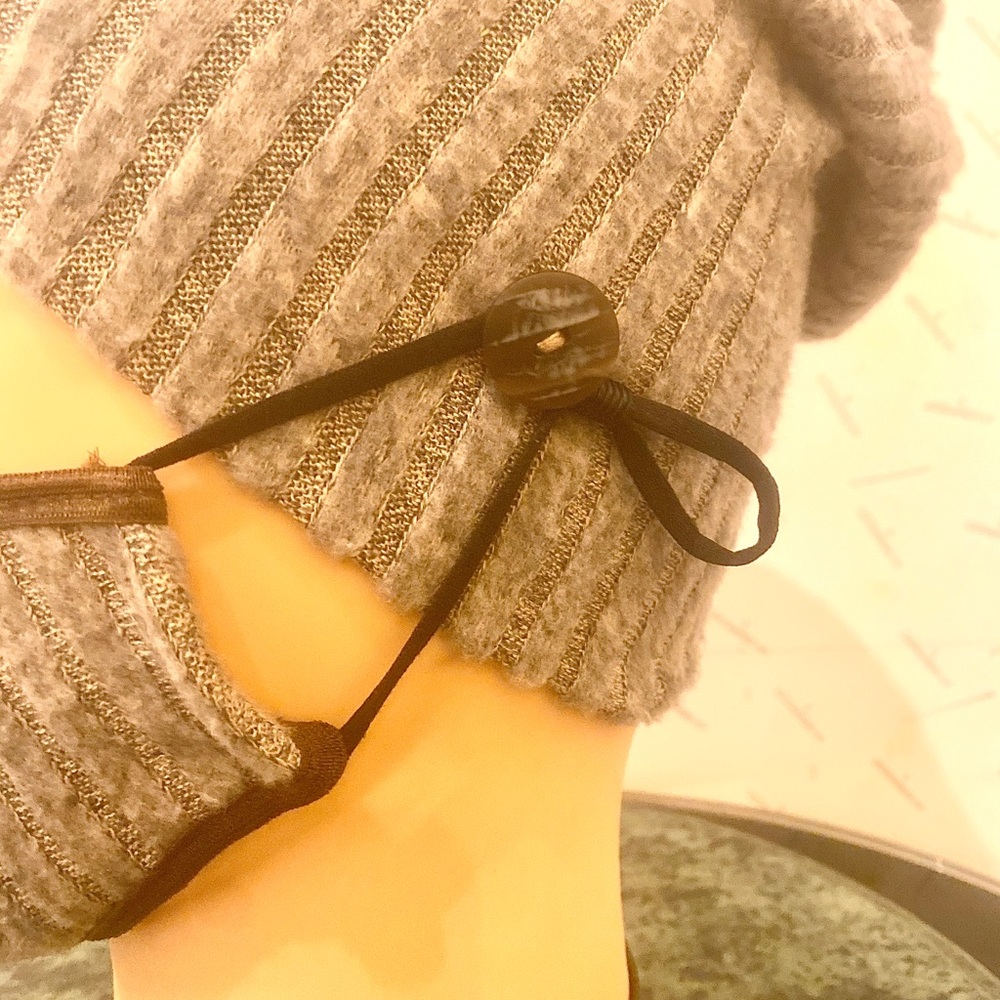 Hat with matching face mask.